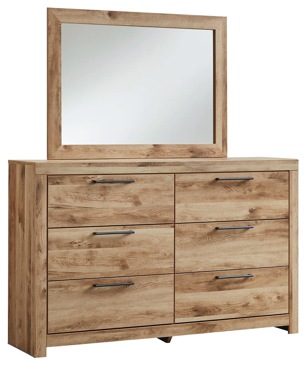 Inspired by natural beauty, refined to perfection. This dresser with mirror brings cozy outdoor vibes to your bedroom with its warm and inviting golden rustic finish. Antiqued gunmetal handles adorn the six drawers on its framed front, adding an industria