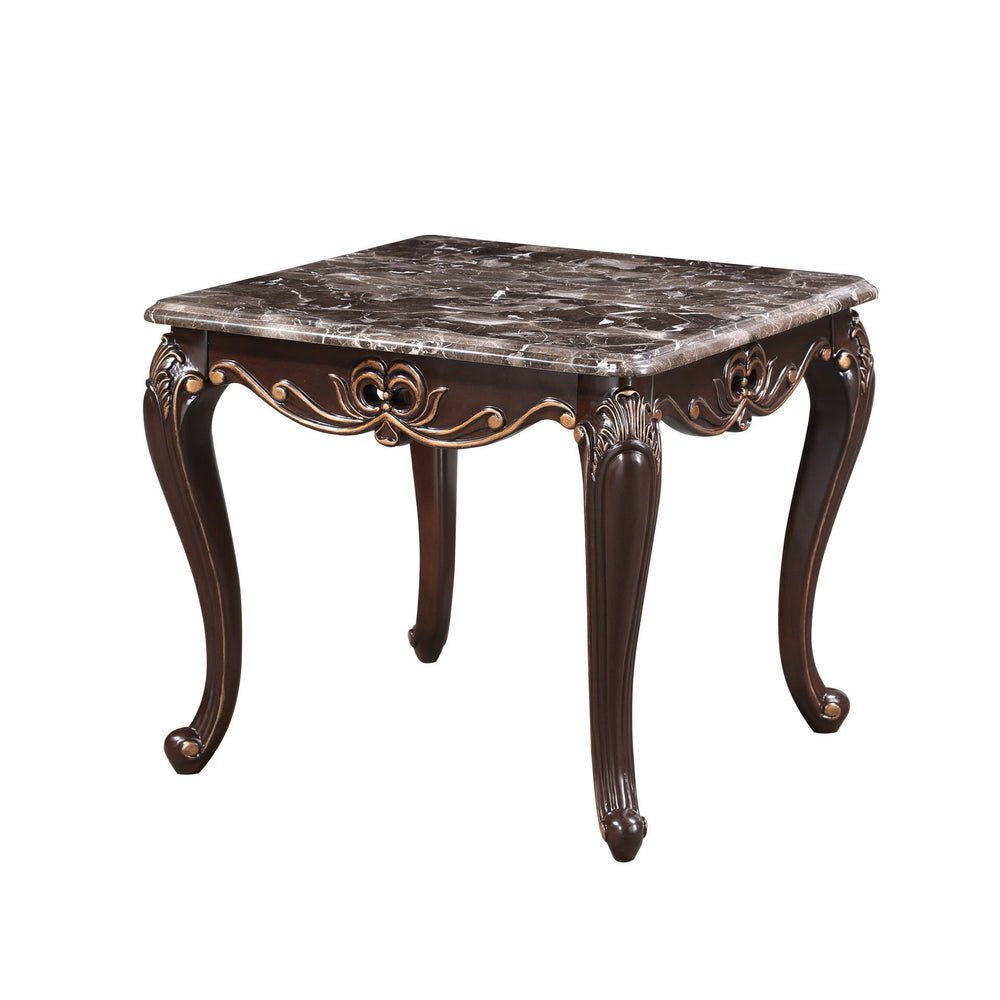 The Royal Classics Constantine End Table in cherry is a stunning blend of heirloom quality and sophisticated design. Crafted from solid pine with premium polyurethane carving details, this piece combines timeless beauty with long-lasting durability. The l