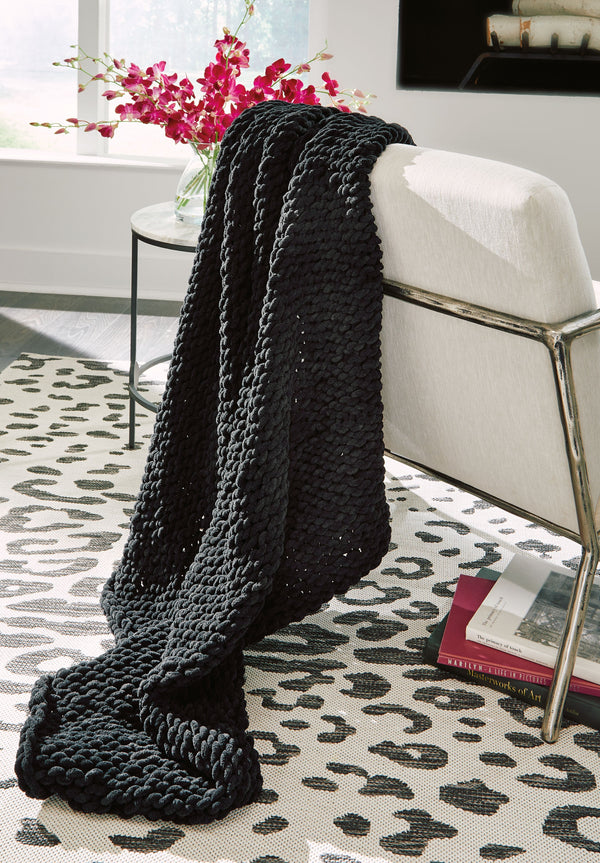  try wrapping yourself in sumptuous chenille polyester with this throw. Hand-knitted for cozy comfort