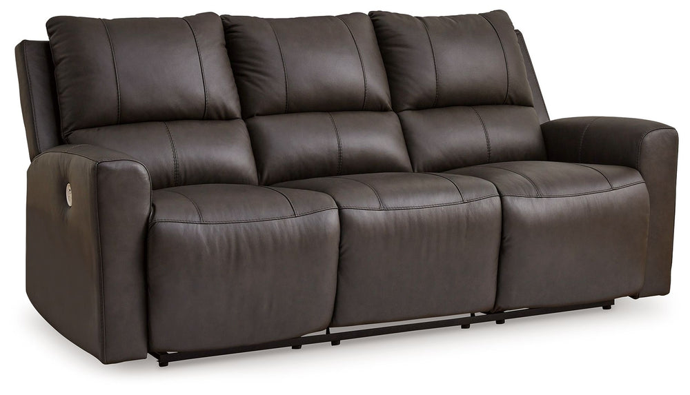 Experience modern luxury with this power reclining sofa. The soft-to-the-touch leather and faux leather upholstery brings ultimate relaxation at a price you can afford. With sleek arms and a plush, pillowy back, the sofa merges comfort and support with a 
