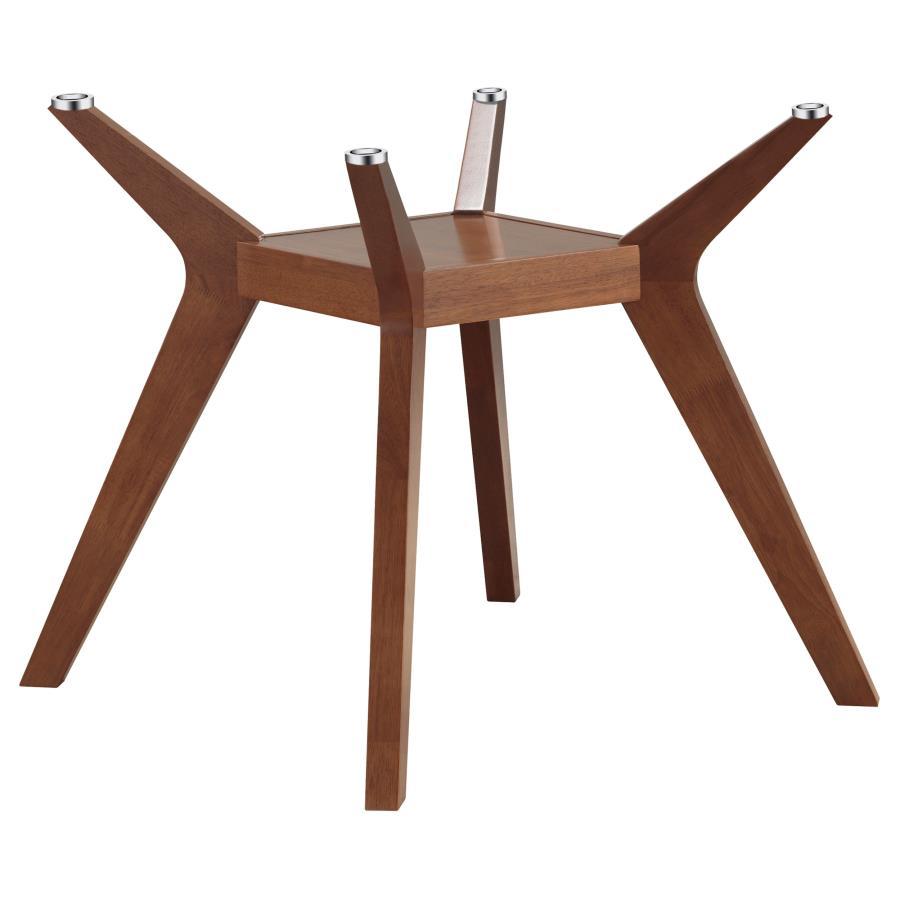 Enjoy delicious meals and engaging conversation seated around this contemporary dining table. From the delightful Paxton collection, the table rests on four angular legs that draw the eye and offer geometric flair. At the point where the legs bend, they-'