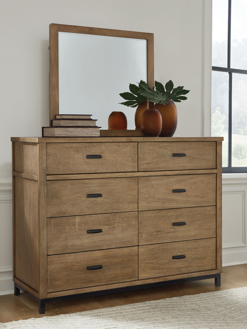 Sleek in its simplicity, this dresser and mirror set takes a relaxed approach to refinement. Its mixed-material design brings a trendy urban-chic feel to your morning and nighttime routines, while functional features keep your bedroom clutter-free. Clothe