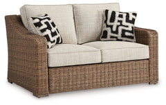 Sporting an easy-on-the-eyes look inspired by driftwood, this loveseat elevates the art of alfresco living. Beautiful and durable enough for indoor and outdoor use, the high-style/low-maintenance seating entices with plush removable cushions wrapped in Nu