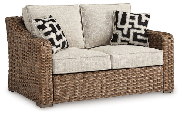 Sporting an easy-on-the-eyes look inspired by driftwood, this loveseat elevates the art of alfresco living. Beautiful and durable enough for indoor and outdoor use, the high-style/low-maintenance seating entices with plush removable cushions wrapped in Nu