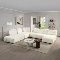 The Loanna collection modular sofa with its beige linen and coral red linen upholstery, offers versatile comfort and style. Its adaptable design allows for multiple configurations, making it perfect for any living space. The combination of neutral and vib