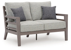 This loveseat is a stylish outdoor piece with staying power. Built for longevity with Weatherwood, an engineered resin polymer with the appearance of wood, it indulges you in contemporary design without sacrificing durability. Stunning form and canâ€™t-mi