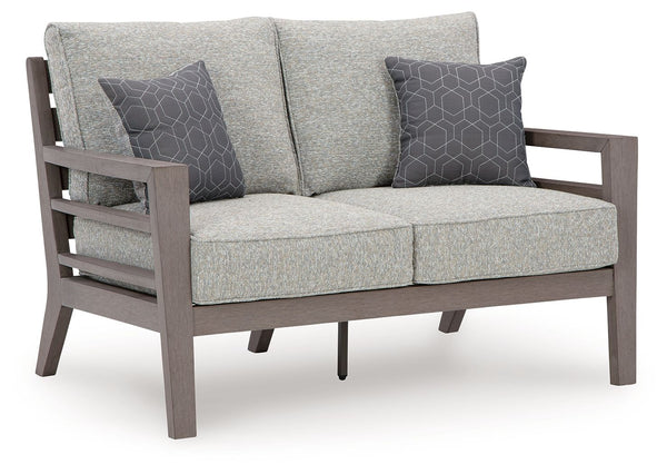 This loveseat is a stylish outdoor piece with staying power. Built for longevity with Weatherwood, an engineered resin polymer with the appearance of wood, it indulges you in contemporary design without sacrificing durability. Stunning form and canâ€™t-mi