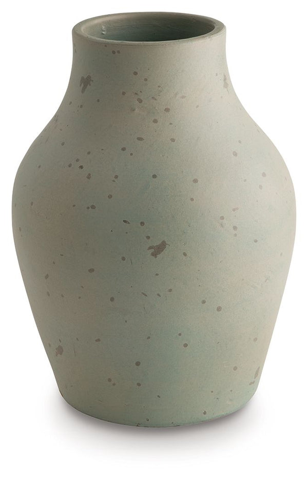 Bring a touch of rustic charm and casual elegance to your home with this terra cotta vase. The antiqued green finish gives it a beautifully weathered look, adding character to your creatively curated space. Let the piece shine on its own, or change things
