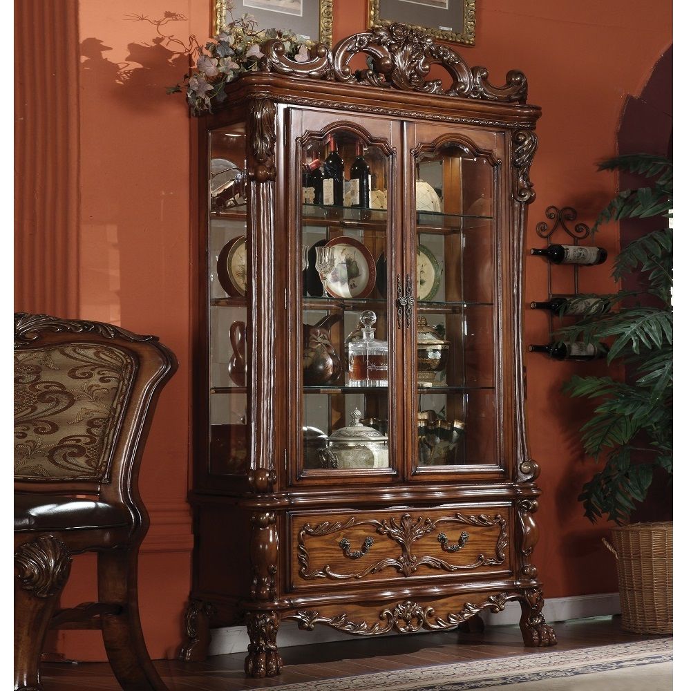 The Dresden traditional collection reflects highly decorative details, pedestal table, oversized claw feet, shaped top and decorative carving inlay veneers on apron. The dining chairs reflect carefully selected wood carving and upholstery in a symphony of