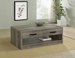  it boasts a natural wood-look design with realistic grain accents. The table includes two drawer