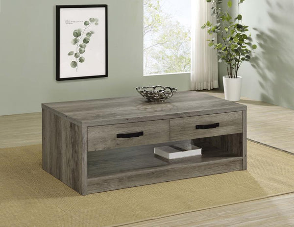  it boasts a natural wood-look design with realistic grain accents. The table includes two drawer