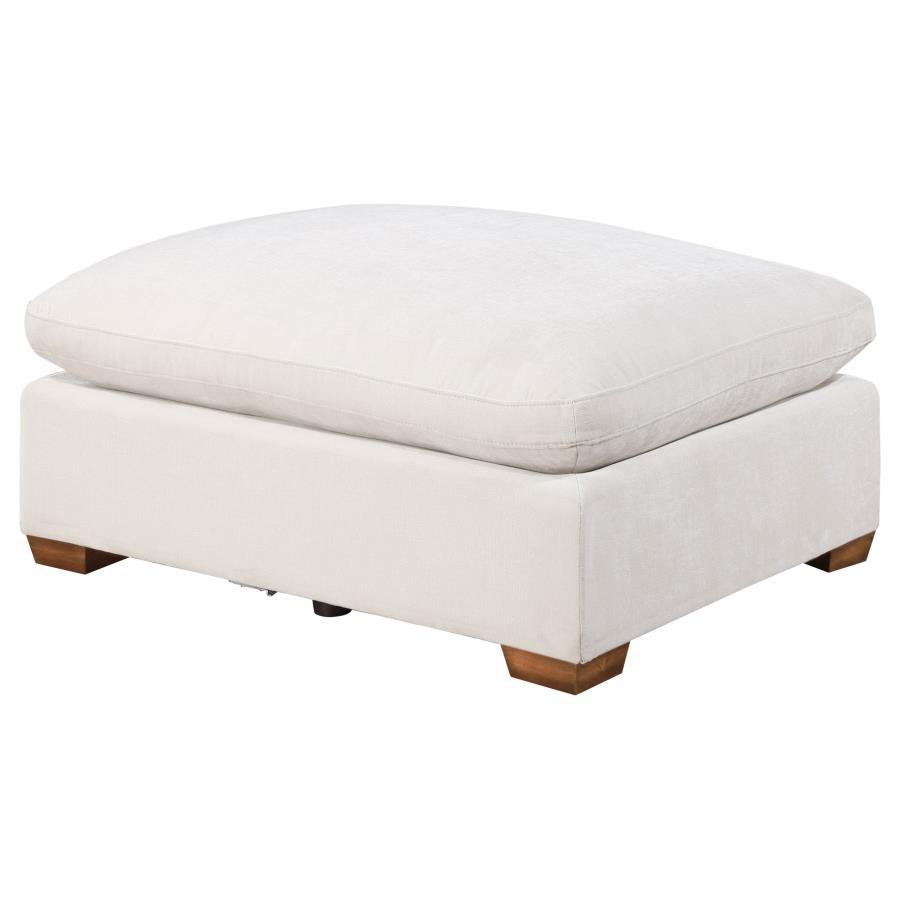 With the easy style of ultra-modern living, the ottoman delivers a streamlined motif with ultimate versatility. A classic layered design offers plush, plump aesthetics merged with a boxy, wood-constructed base. Smooth fabric upholstery covers wood framing
