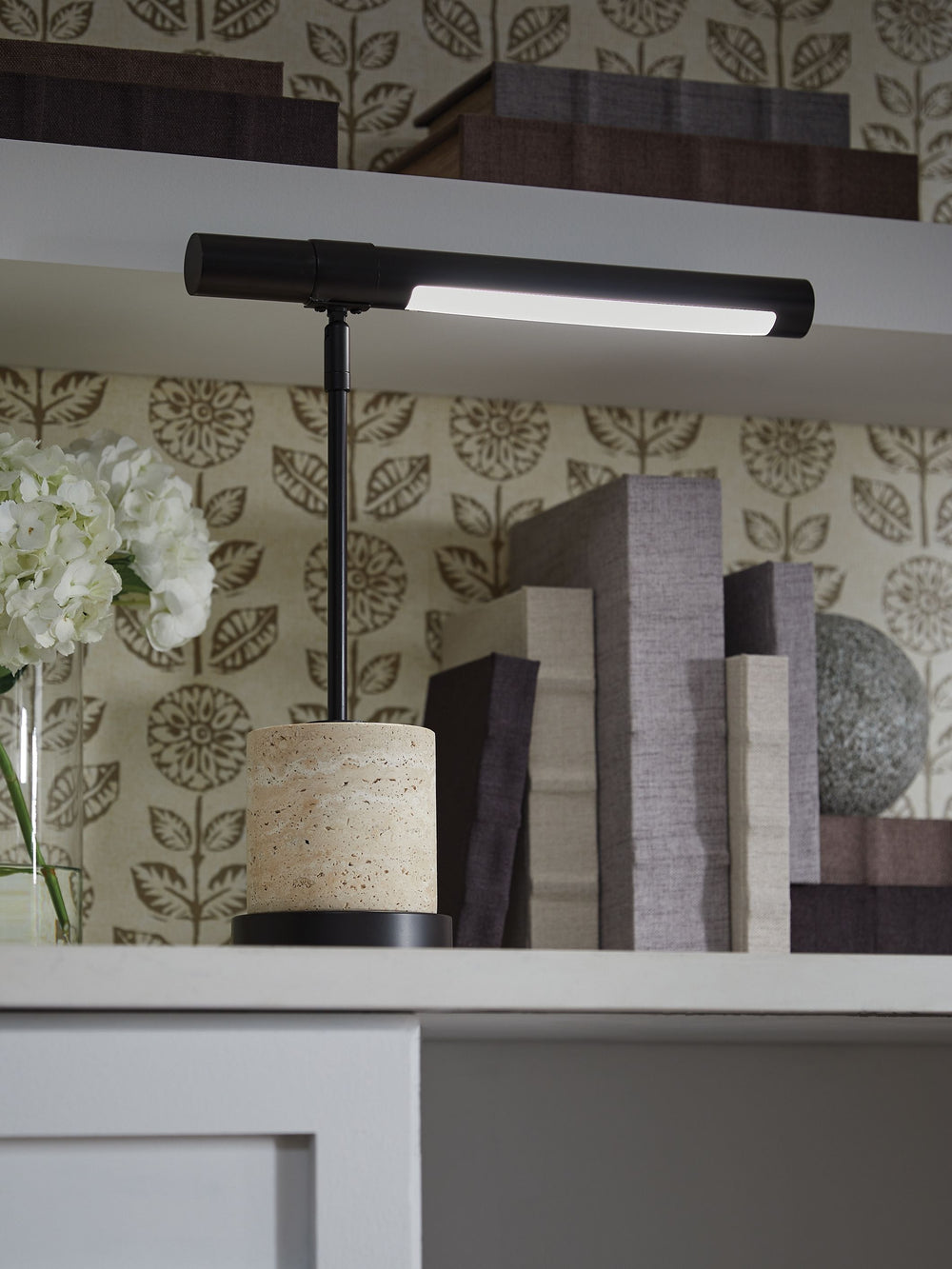 Love clean lines and sleek styling? Then this desk lamp is sure to find a place in your heart. Its architectural lines and beige travertine base are stunning in their chic simplicity. And USB-C charging in the base allows you to keep devices nearby while 