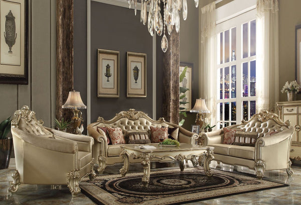Tracing back to the classical Baroque era, expressed with intent and conviction, our new interpretation of Vendome II is donned. The Vendome II sofa-'s bone faux leather upholstery is grand and classy with crystal like button tufting on the back in a crac