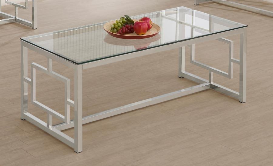 This rectangular coffee table, also known as a cocktail table, brings a sleek modern design to your living room. The clear tempered glass top offers durability and elegance, while the electroplated chrome frame features a polished, reflective finish. Its 