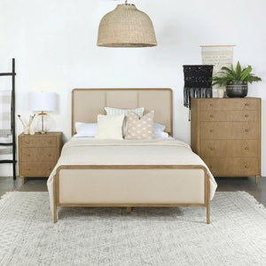  designed with retro-inspired elements and luxurious details. Cream fabric upholstery on the headboard and footboard is framed by a sleek black edge