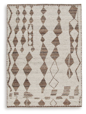 With its striking geometric design, this area rug knows how to make a subtle statement. Its shades of beige and brown are a welcome complement underfoot that doesnâ€™t overtake your roomâ€™s decor. This beautiful rug infuses a laid-back sensibility that s
