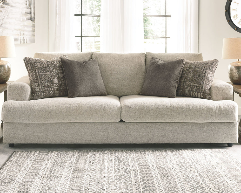 Flaunting a trendsetting silhouette, this sofa puts the contemporary in your contemporary home. Its â€œthree over twoâ€ profile eliminates the center seat cushion, giving you elongated plushness and deep seating. And the chunky chenille fabric satisfies 