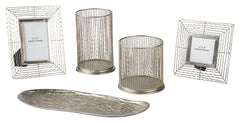 Make some waves with this highly contemporary accessory collection. Wonderfully open and airy, the wavy metal frames and hurricane candle holders beautifully go with the flow. Organic shaped tray is a natural complement.<br><br><b>Additional Dimensions</b