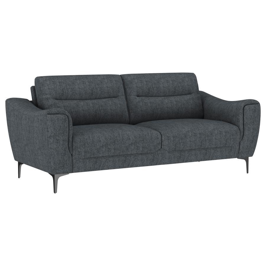 Indulge in effortless style and comfort with this chic transitional sofa. Soft charcoal upholstery gracefully harmonizes with any dÃ©cor, while plush pocket coil seat cushions and modern track arms provide inviting support for your downtime. Designed with