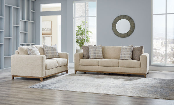 Serene style with a modern sensibility. Delight in the cozy, versatile embrace of this living room set. It takes an on-trend approach to irresistible texture and natural beauty, showcasing soft neutral upholstery accented with a transitional wood trim. As