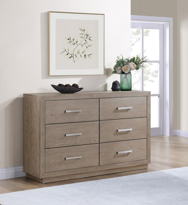 understated design that showcases a wide top and recessed base that pair to deliver a timeless look. The dresser shows off wood grain details in a neutral bar