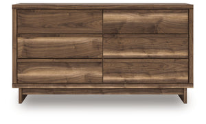  while the angular base incorporates contemporary motifs. Integrated drawer handles round ou