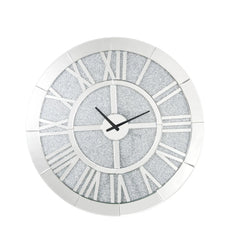 This Nowles round wall clock is covered in beveled mirrored panels that highlight its glamorous style. Featuring crushed acrylic faux diamonds that will naturally attract the eye. Durable engineered wood supports the frame. The clock face comes with a tim
