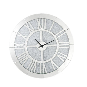This Nowles round wall clock is covered in beveled mirrored panels that highlight its glamorous style. Featuring crushed acrylic faux diamonds that will naturally attract the eye. Durable engineered wood supports the frame. The clock face comes with a tim