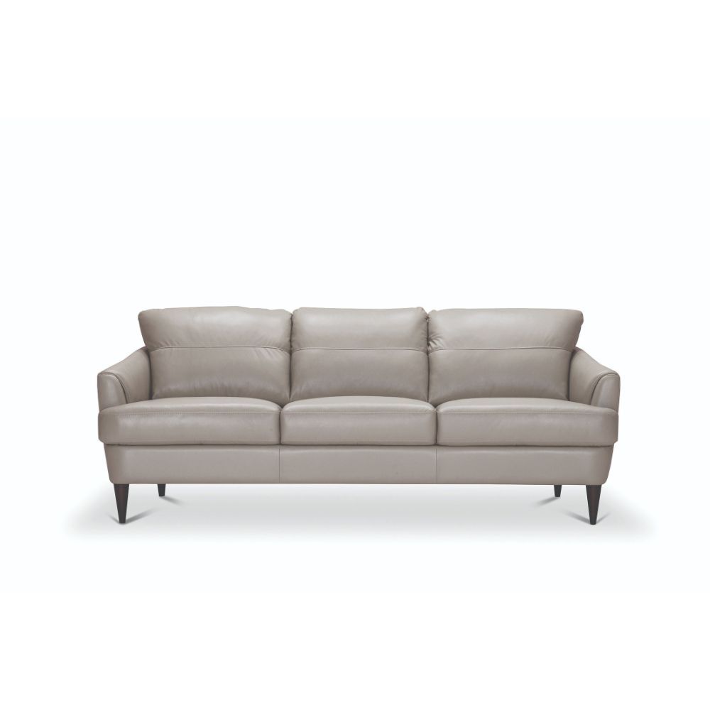 The Helena sofa set is one you-'ll want to spend lots of time in. Designed with contemporary fashion, this beautiful moss green or pearl gray leather sofa features a T-shape cushion with contrast tone stitching and unique tapered wood legs. Its deep, comf