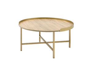 Explore modern simplicity that easily improve your overall aesthetic. The Mithea Coffee Table features a round table top with cross bar styled metal base, offering a balance of grace and strength. An alluring gold finish showcases it-'s clean-lined silhou