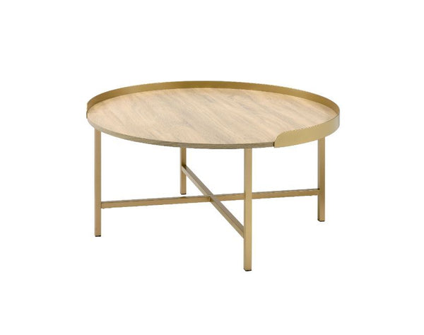 Explore modern simplicity that easily improve your overall aesthetic. The Mithea Coffee Table features a round table top with cross bar styled metal base, offering a balance of grace and strength. An alluring gold finish showcases it-'s clean-lined silhou