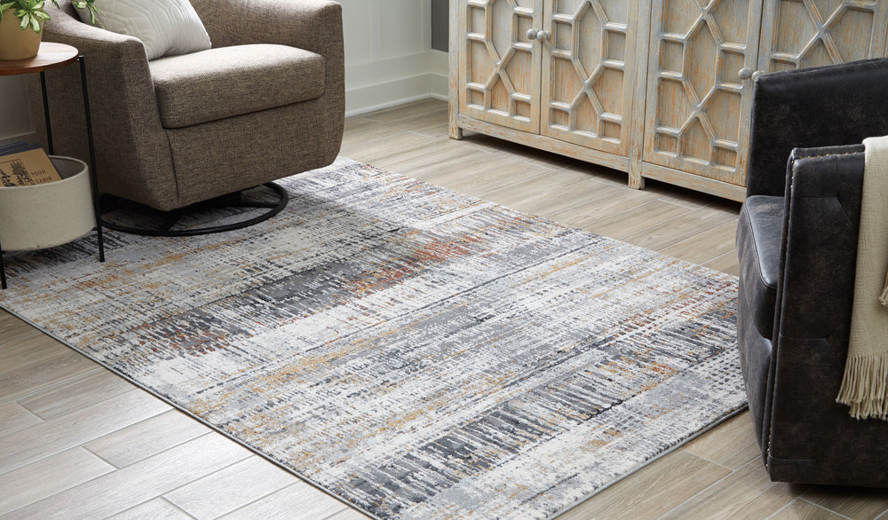 Calm, cool and collected. This rug takes inspiration from active contemporary lifestyles and chic sensibilities alike. Neutral hues and muted hints of color make the abstract pattern feel surprisingly sparse. This luxe rug is sure to lay beautifully under