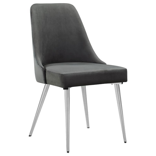  the plush padded seat and curved backrest provide a supportive and inviting feel. Tapered metal legs in