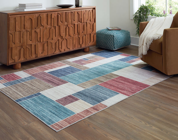  this area rug is sure to please with its vibrant palette and geometric design. And it-'s machine washable