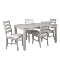 Experience the Pascal 5 Piece Dining Room Set in Driftwood Gray, a perfect blend of style and functionality. This set includes a 59-inch long rectangular wood dining table and four matching chairs, all crafted from a combination of solid Rubberwood and ma