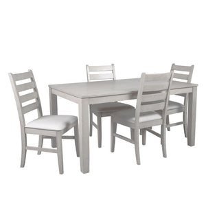 Experience the Pascal 5 Piece Dining Room Set in Driftwood Gray, a perfect blend of style and functionality. This set includes a 59-inch long rectangular wood dining table and four matching chairs, all crafted from a combination of solid Rubberwood and ma