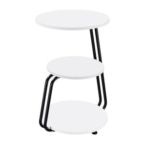 Put final touches on a modern living space with the sculpted flair of this contemporary accent table. The three-tier design is eye-catching and versatile, offering spaces for decor and essentials like a book or beverage. The table boasts a bright white fi