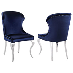 Indulge in the ultimate dining experience with the demi wing dining side chair. Its polished stainless steel cabriole legs exude sophistication, while the individually hand-driven nailhead trim adds a luxurious touch. Wrapped in soft velvet upholstery, th