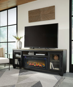 This TV stand with fireplace is rustic, casual contemporary style simply done right. Its two-tone color scheme features a rich brushed black finish accented with a dusty grayish brown wood tone. With two glass-front cabinets (each with an adjustable shelf