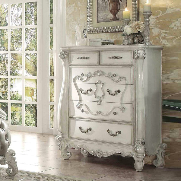 The Versailles chest is the perfect accent to create the style of royalty your bedroom has been needing. This chest crafted in wood with bone white finish was inspired by old European design with brown copper metal hardware and intricate wood carvings on 