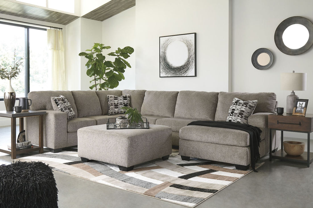 A mastery in less is more, this sectional manages to make cool, contemporary design so warm and cozy. A new twist on neutral, the sectionalâ€™s soothing -"platinum-" tone upholstery is incredibly plush to the touch. Gently rounded corners give the clean-l