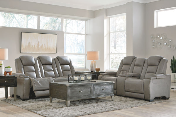 Reserved for him and made for her, this power reclining set delivers all the comfort and style you could ask for. Inspired by sports car interiors, the seating area is covered in real leather for your pleasure, with a â€œperforated automotiveâ€ treatment