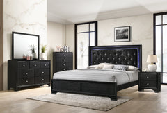 Step into a realm of sophistication and comfort with this stunning bedroom collection. Each piece showcases an exquisite blend of traditional charm and contemporary flair, making a bold statement with its textured surfaces and rich black finish. The bed, 