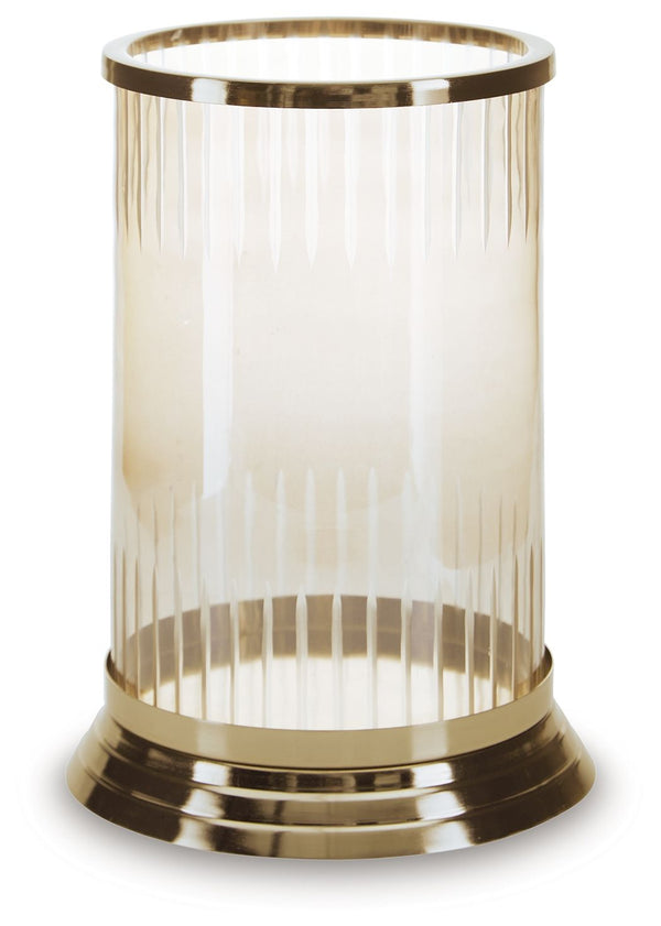 Illuminate your home in traditional style. A brass-tone finish on this candle holder brings a classic feel to the metal base. Its carved glass, in a light amber hue, gives you a timeless aesthetic you can love.<br/><br/><b>Product Features</b><ul><li>Made