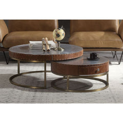 Enhance the modern vibe of your living room with the Tamas round coffee table. Its slender metal base is artfully curved to add style, and the aluminum patchwork table top provides a durable surface for piping hot or ice-cold beverages. The apron is wrapp