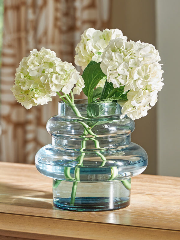  the statement-making accentâ€”crafted from blown glass in a blue hueâ€”rounds out your modern decor beautifully.<br/><br/><b>Product Features</b><ul><li>Made with