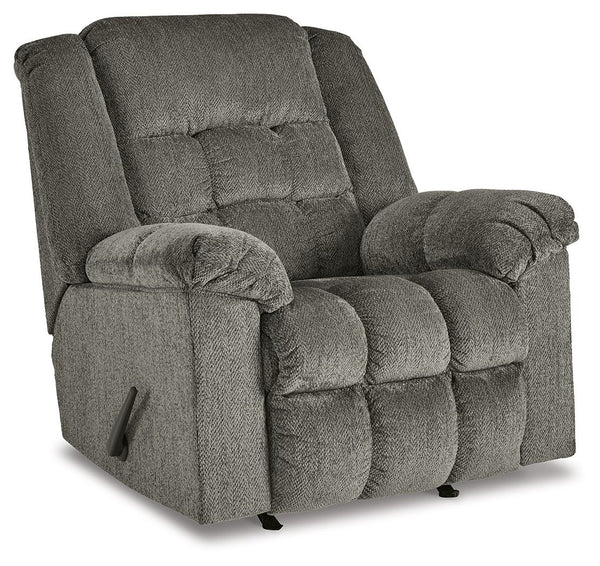 Prioritize comfort while still making a versatile style statement. Complementing a variety of color schemes, this rocker recliner-'s supremely plush seating lines you up for hours of leisure. Its one-pull reclining motion places you in optimal TV watching