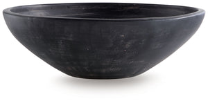 Celebrate the artisanal character of ceramics with this bowl. Its distressed black finish has a time-worn, weathered appeal, offering the look of the past with a modern feel. The bowl-'s neutral tone makes it a go-to for all seasons, allowing you to stage