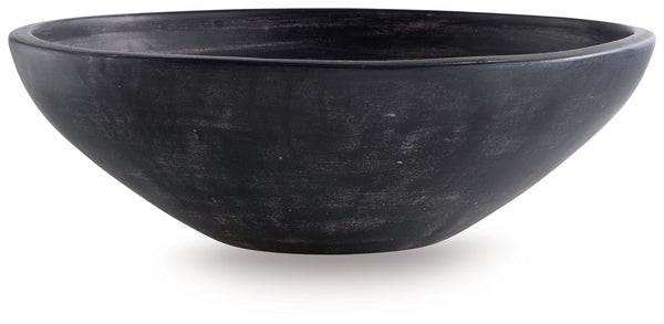Celebrate the artisanal character of ceramics with this bowl. Its distressed black finish has a time-worn, weathered appeal, offering the look of the past with a modern feel. The bowl-'s neutral tone makes it a go-to for all seasons, allowing you to stage